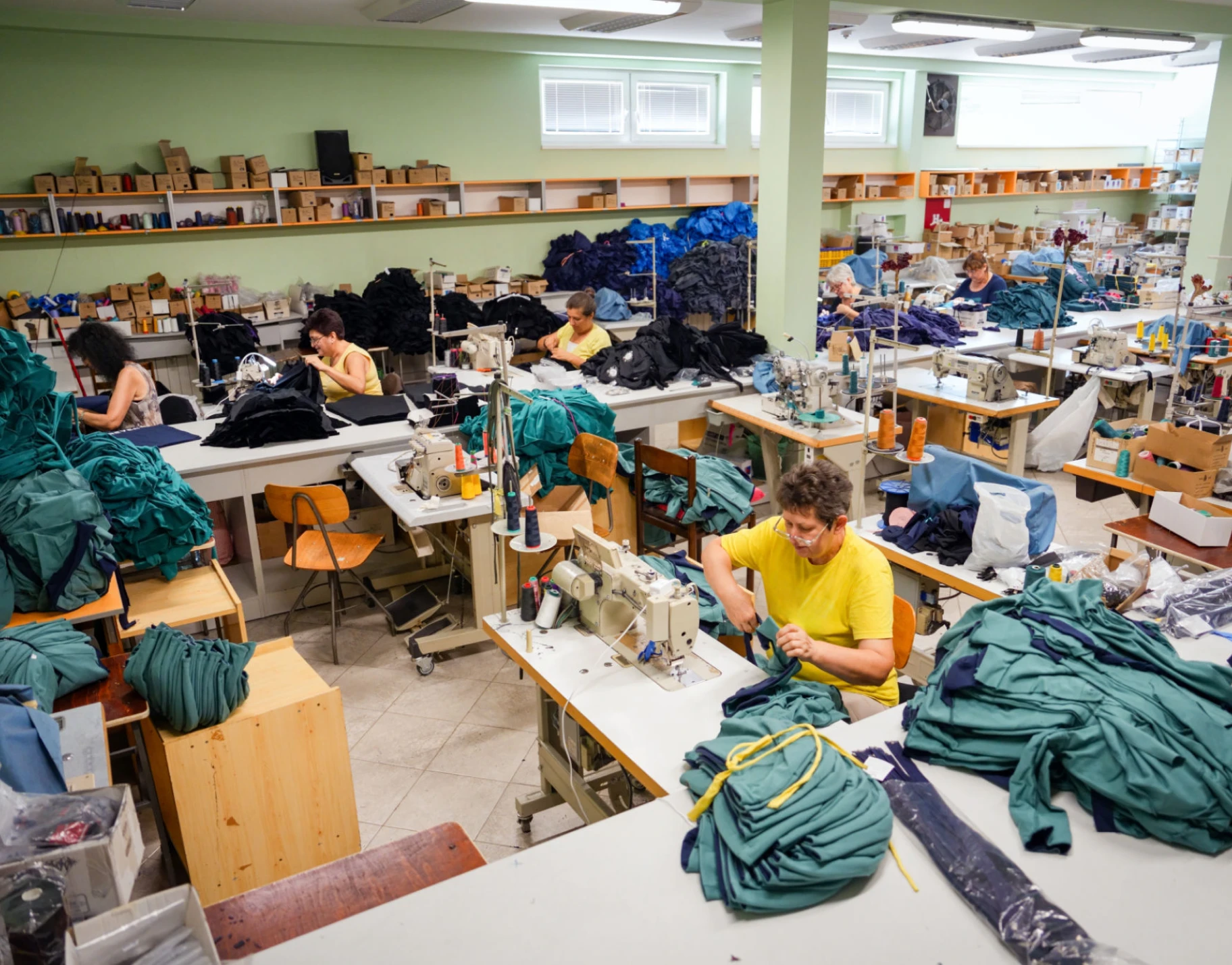 Workers sewing in garment factory